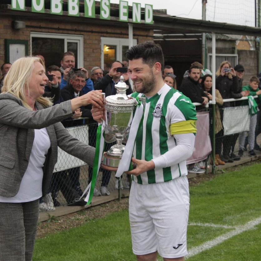 ESL Sec Michelle Dorling hands the trophy to GWR skipper Scott Pethers (Credit: Andy W)
